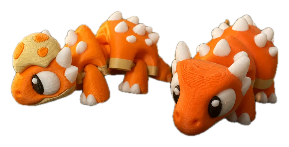 Ankylosaurus duo: twee oranje 3D-geprinte pantserdino's met witte stekels