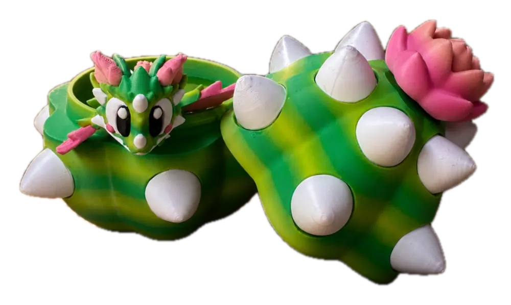Cactus draak met ei: groene cactuspod met roze bloemen op het afneembare deksel, 3D-geprint