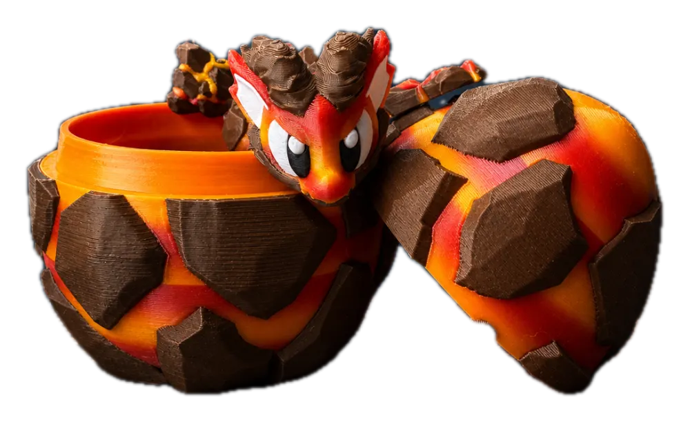 Lava draak met ei, zwart drakenei met rood-oranje lava-structuur en beweegbare draak